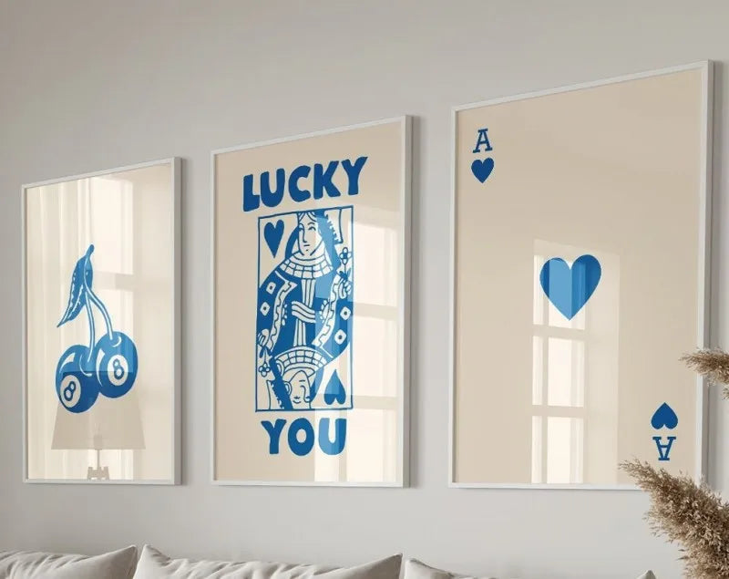A set of three framed art prints featuring lucky hearts and the word you