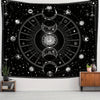 A dark tapestry featuring a celestial sun and moon design with zodiac art against a starry background.