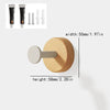 Solid beech wood wall hook rack with four hooks and a round wooden mounting piece.