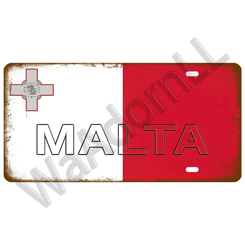 A rectangular sign featuring the flag of Malta with a cross emblem and the word MALTA in large, bold letters.