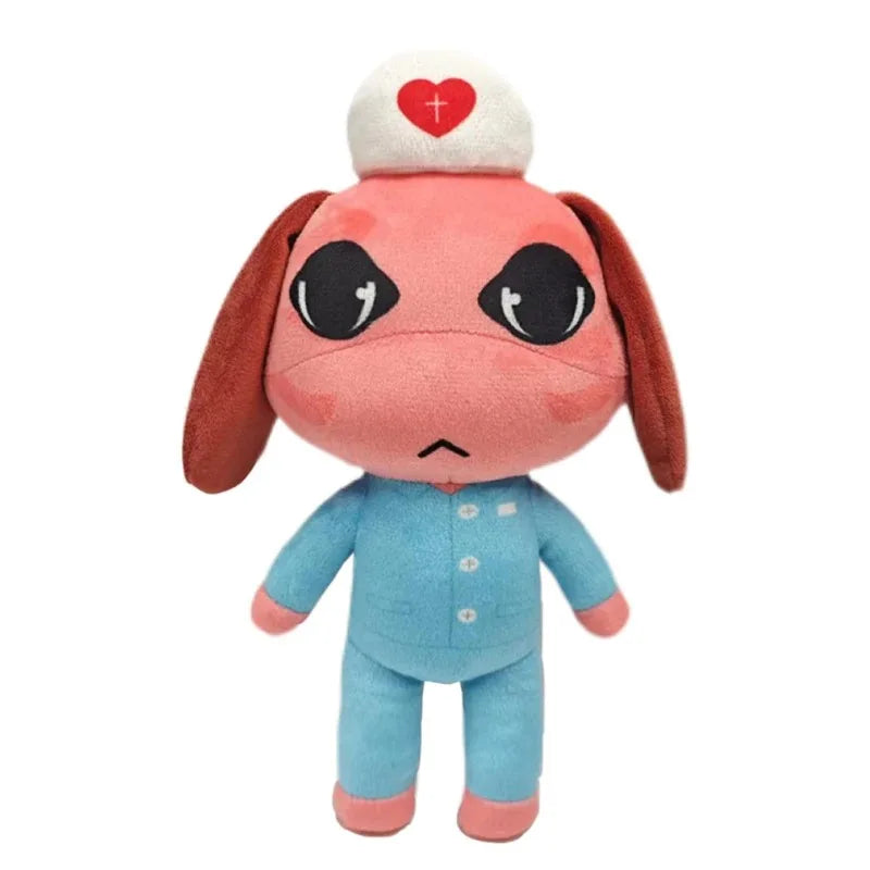 A blue dog plush toy with pink ears and a red cross on its head.