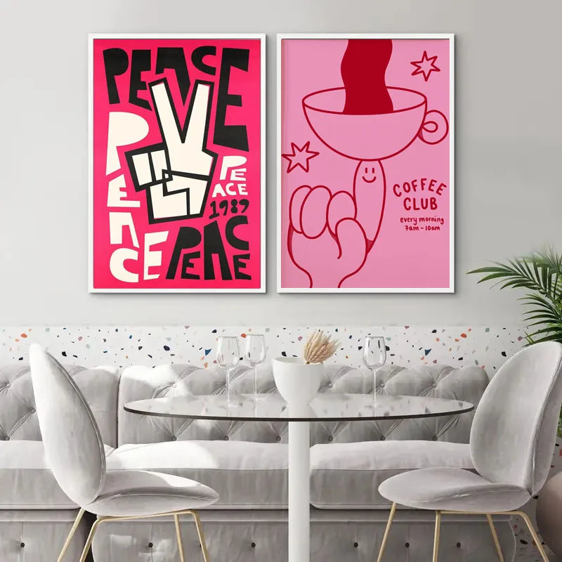 Dos piezas de arte en lienzo pintadas a mano enmarcadas con tipografía audaz y formas abstractas en una pared gris claro.