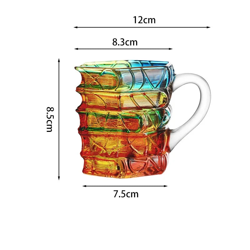 Hand-painted mug featuring stacked layers of vibrant orange, yellow, and green glass designs.