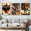Three framed posters featuring characters and scenes from Attack on Titan displayed on a light gray sofa.
