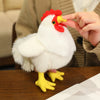 A white plush rooster toy with a red comb and beak is being touched by a person's finger.