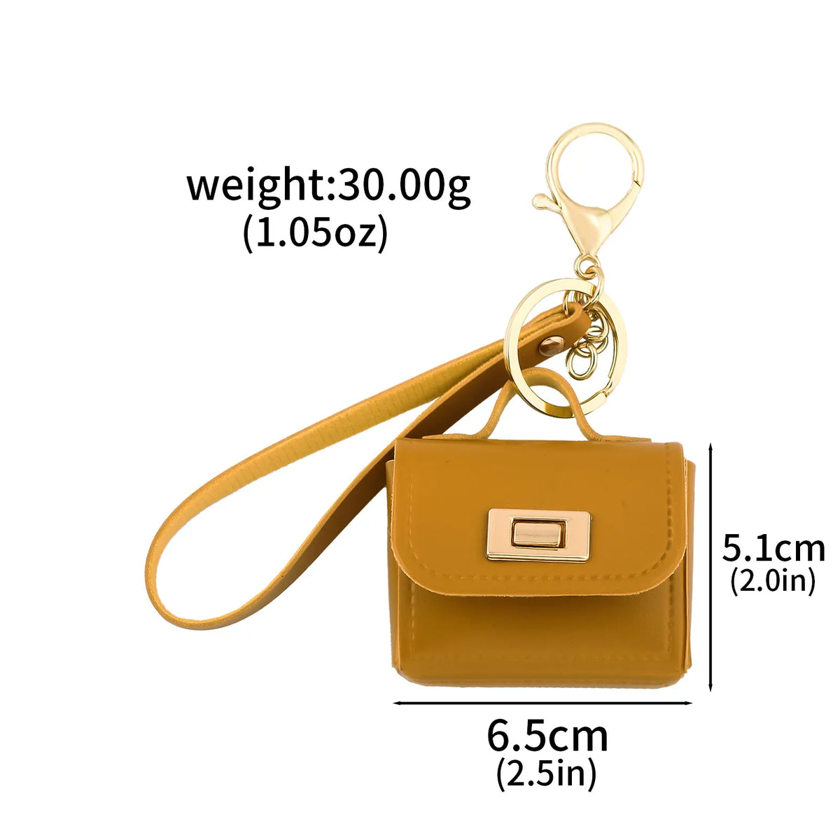 A small mustard yellow leather openable bag attached to a gold-colored keychain.