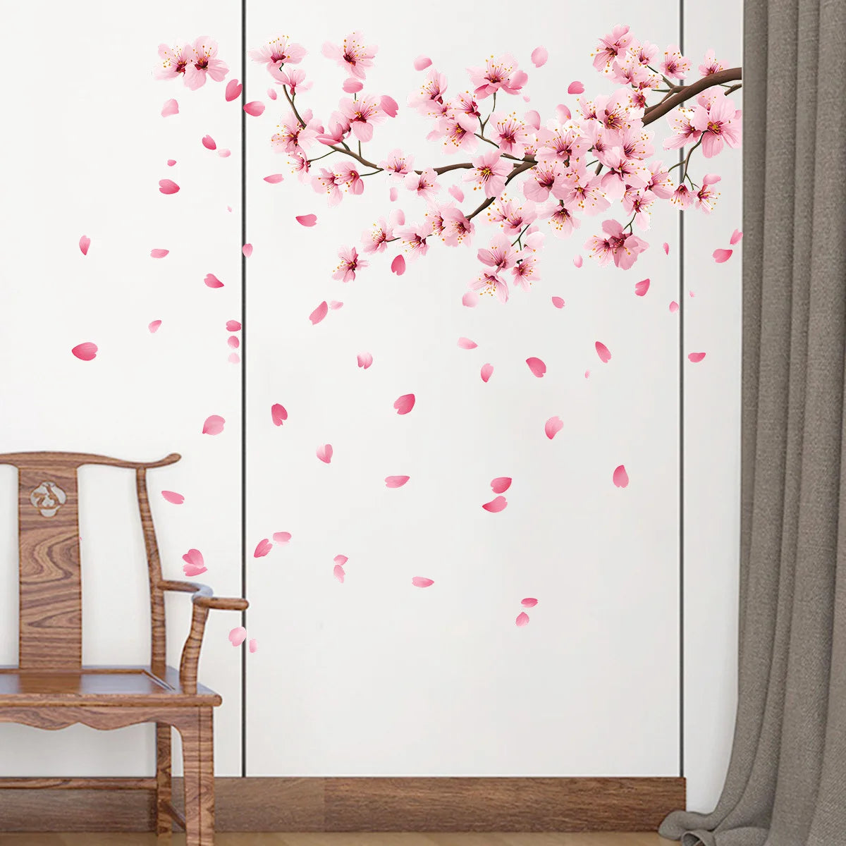 Pink peach blossom branch wall decals featuring delicate pink flowers and petals on a white background.