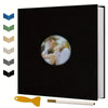 A black magnetic scrapbook album with a circular photo insert and a yellow tool.