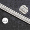 White 4 cm wide self-adhesive corner wall trim strip featuring an ornate pattern.