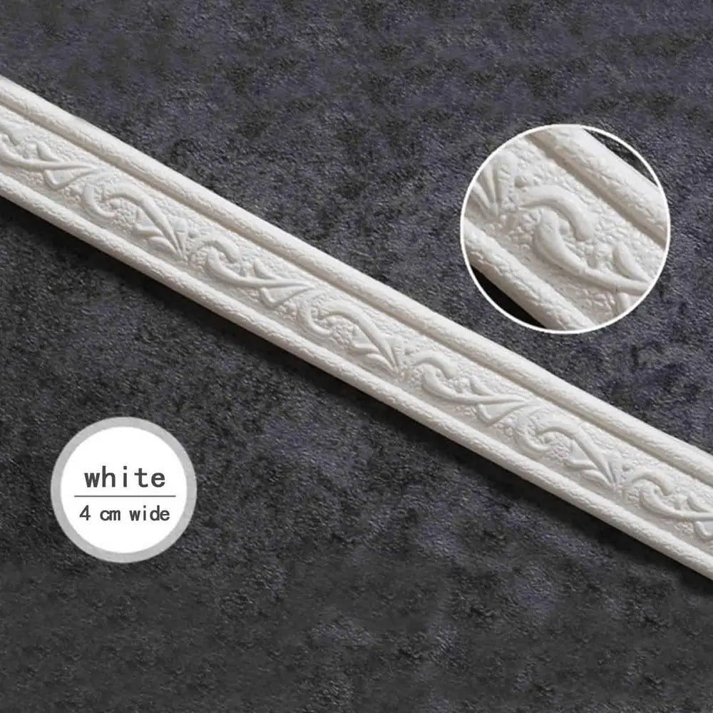 White 4 cm wide self-adhesive corner wall trim strip featuring an ornate pattern.