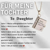 A silver pendant necklace featuring an openable book design with engraved German text for a daughter