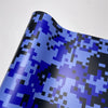 A close-up of a color-changing digital camouflage vinyl wrap film displaying shades of blue, purple, and black.