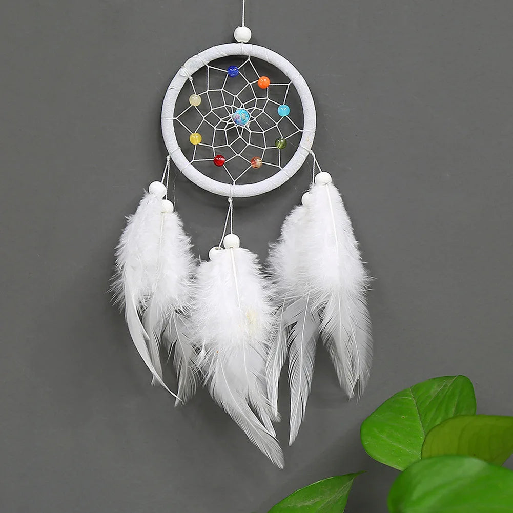 Handmade boho feather dream catcher wall decor with a white hoop and colorful beads