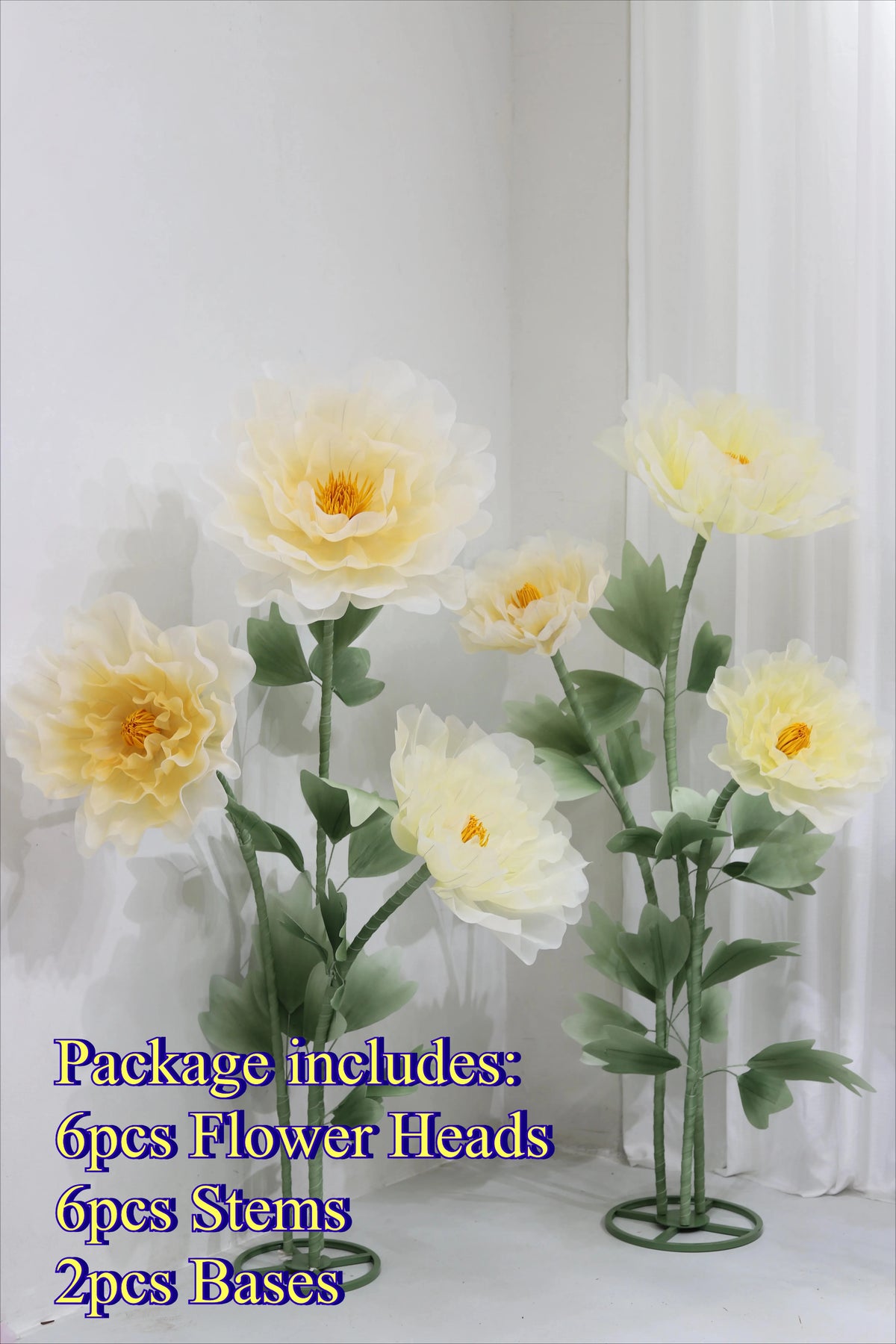 A bouquet of yellow silk poppy flower heads, stems, and bases displayed on a green stand.