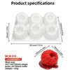 White silicone mold with six cavities for making raspberry mousse or fruit desserts.