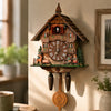 A vintage wooden cuckoo clock with an hourly chime mounted on a wall.