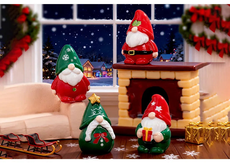 A set of festive resin Christmas dwarf figurines, including a Santa figure, a green Christmas tree, and a red fireplace mante