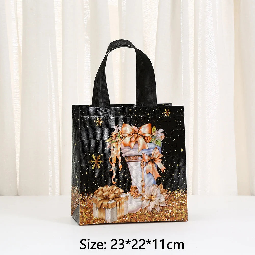 Black non-woven gift tote bag with gold glitter accents and an orange bow design