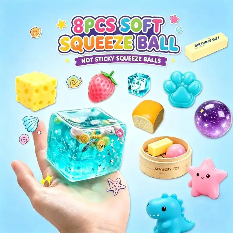 A hand holds an assortment of 8 pieces of soft squeeze balls including a yellow ball, a strawberry, and a purple glitter ball