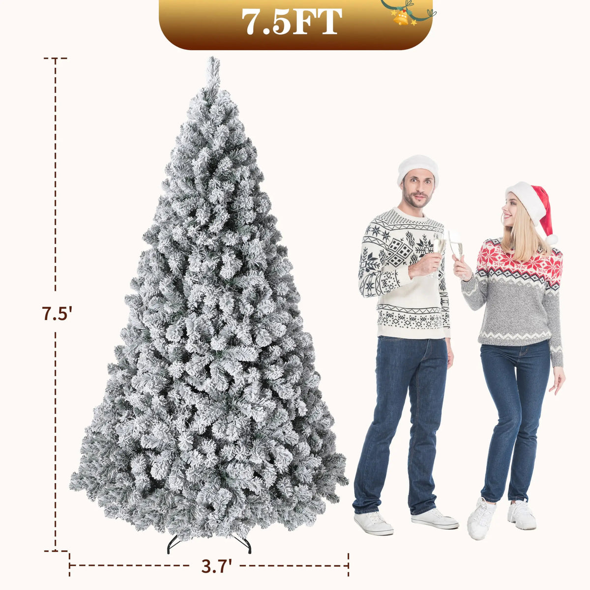 A flocked artificial Christmas tree standing next to a man and a woman.