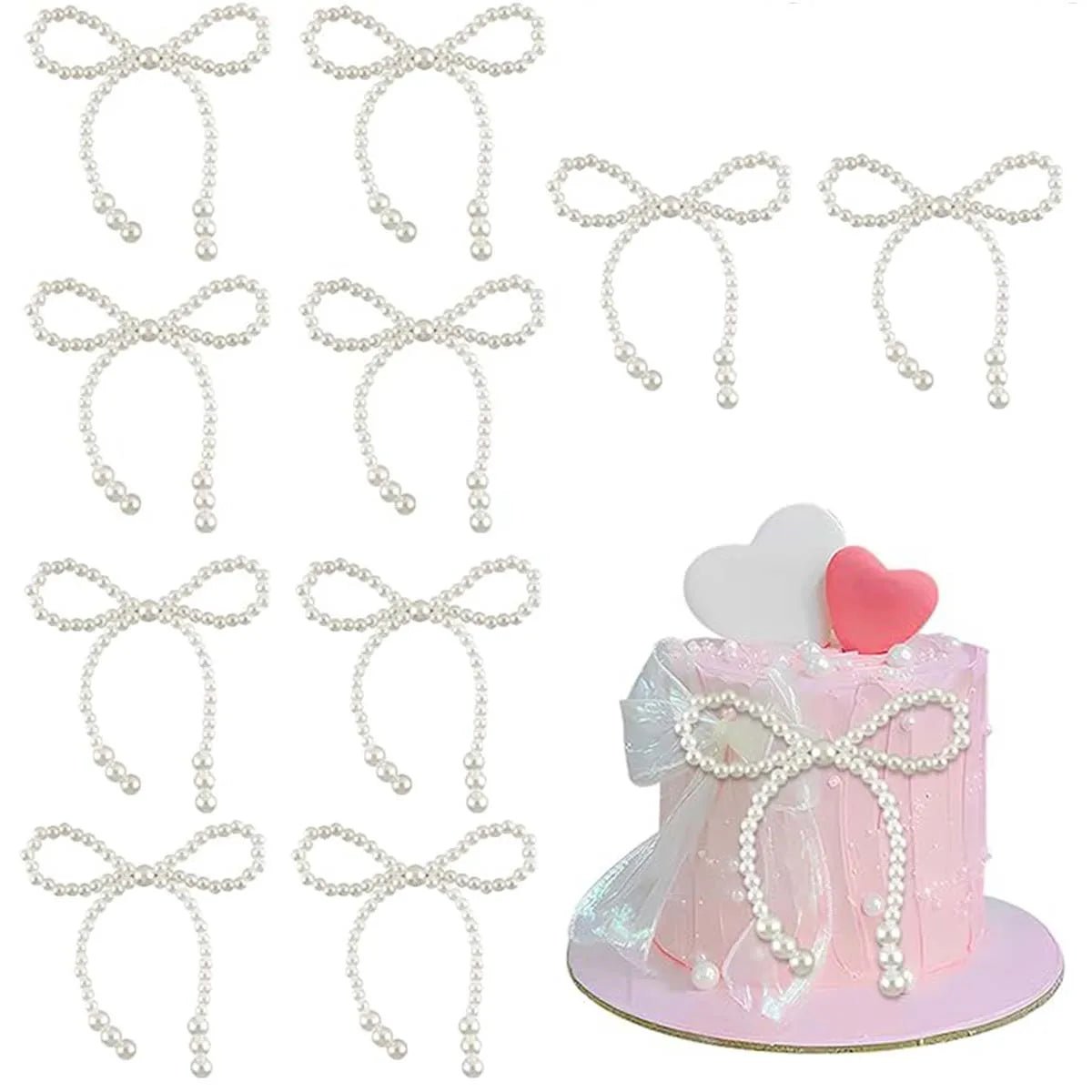 A set of pearl bow cake toppers and decorations for elegant party themes.