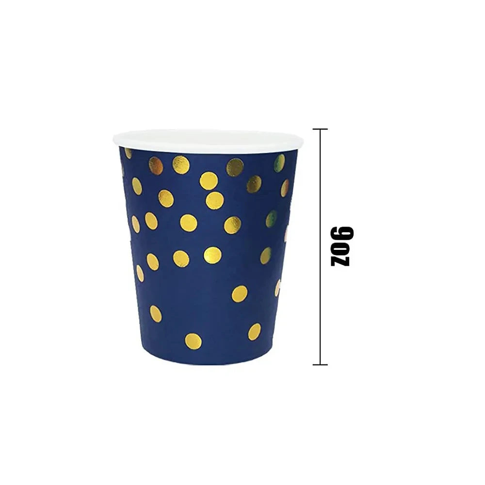 A navy blue disposable party cup with gold polka dots, shown standing upright.