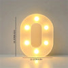 A glowing letter O made of LED lights, illuminating a room or used for party decor.