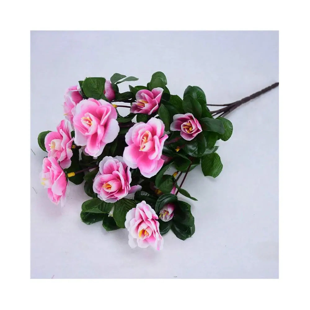 A cluster of pink and magenta artificial azalea flowers on green leaves for outdoor decor.