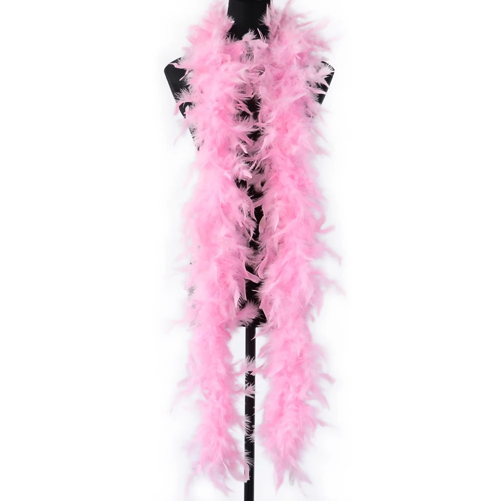 Pink natural turkey feather boa displayed on a hanger