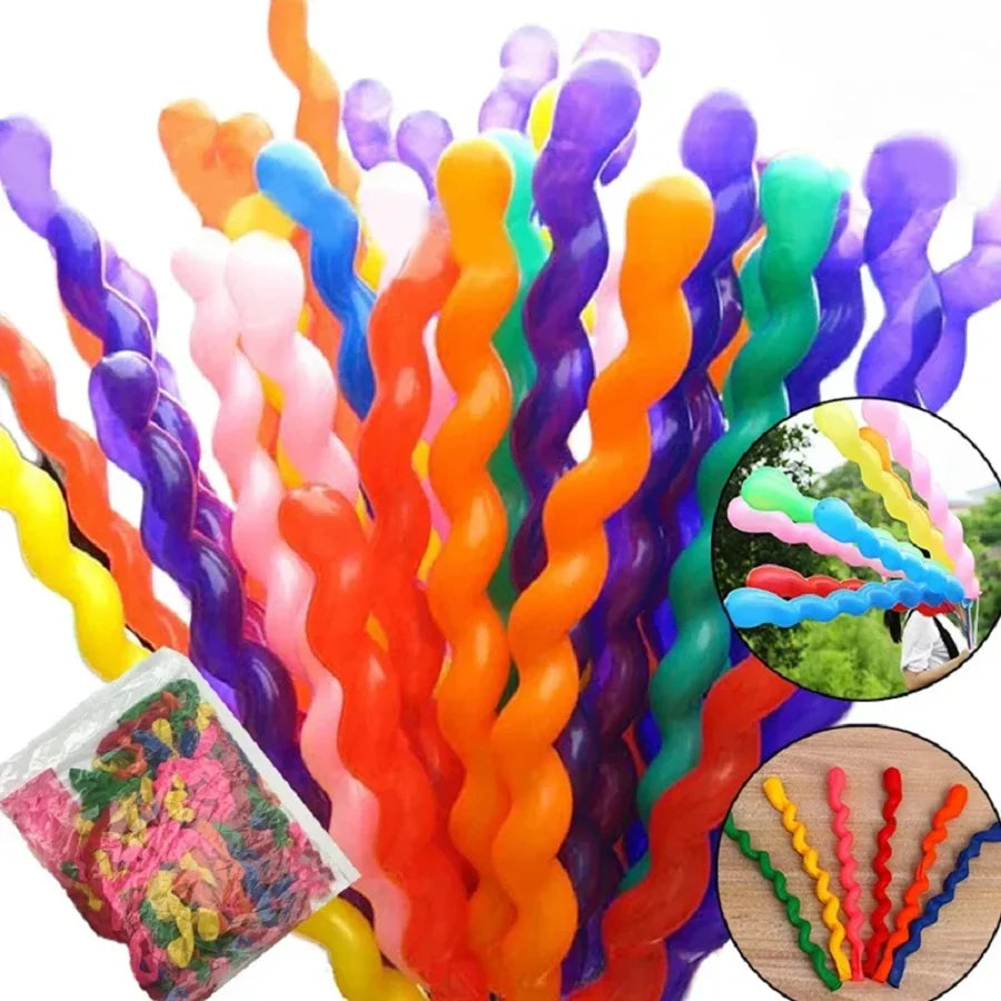 A bundle of colorful spiral latex party balloons in various bright colors like orange, purple, blue, and green.