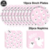 A set of 10 nine-inch pink plates and 20 napkins featuring white ghost designs for a Halloween party.