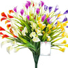 A vibrant bouquet of artificial calla lilies in various shades of pink, purple, and white.