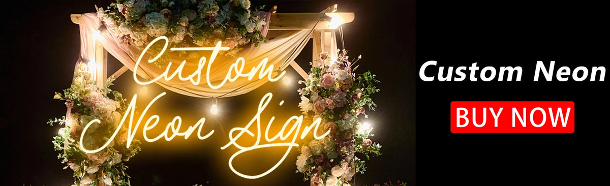 A custom neon sign featuring the words Custom Neon Sign decorated with floral arrangements against a dark background.