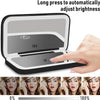 Portable touch screen makeup mirror showing brightness adjustment levels from 0% to 100%