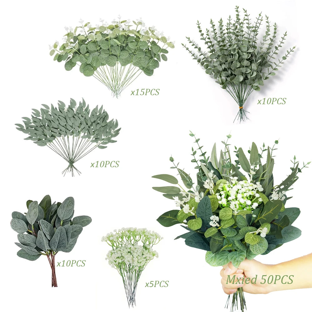 A collection of mixed artificial eucalyptus leaves in various sizes and arrangements for DIY decor.