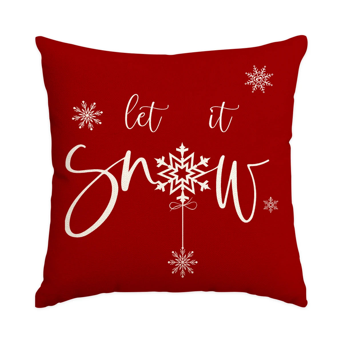 A deep red cushion cover featuring white text 'let it snow' and a central snowflake design.