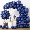A navy blue balloon garland arch kit featuring balloons of various sizes arranged in an arch shape.