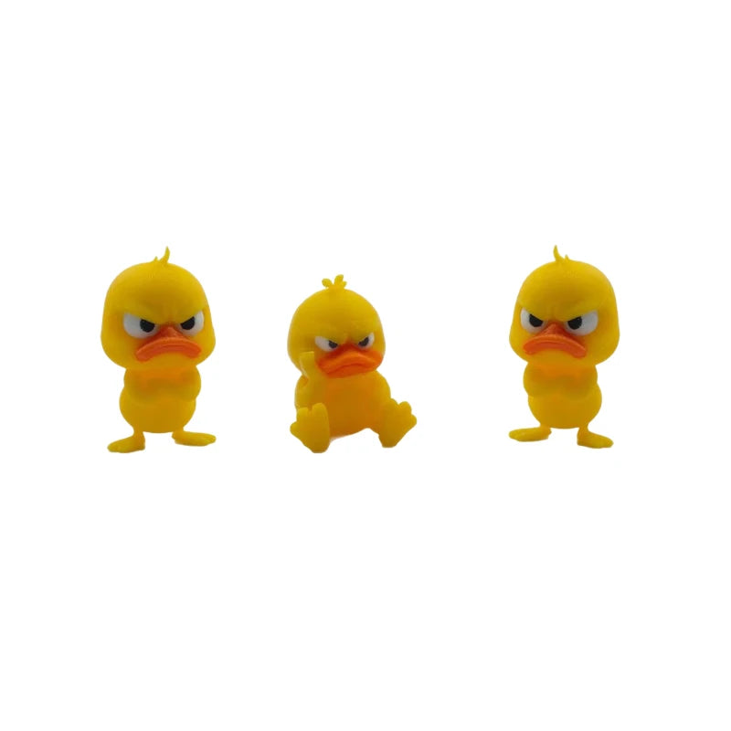 A yellow 3D printed statue of an angry duck with furrowed brows.