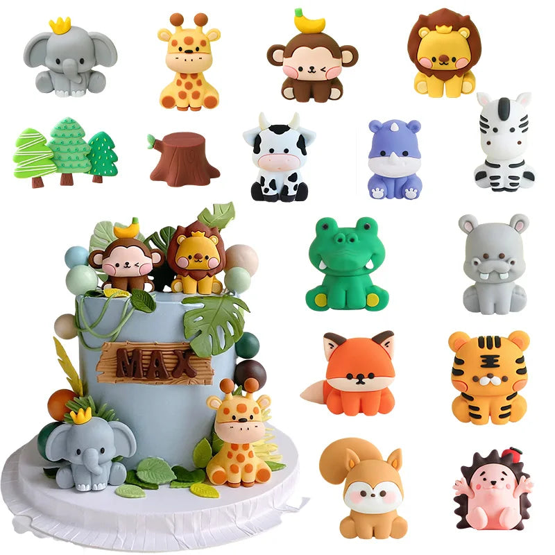A collection of various jungle and safari animal cake toppers including elephants, monkeys, tigers, and other wildlife figure