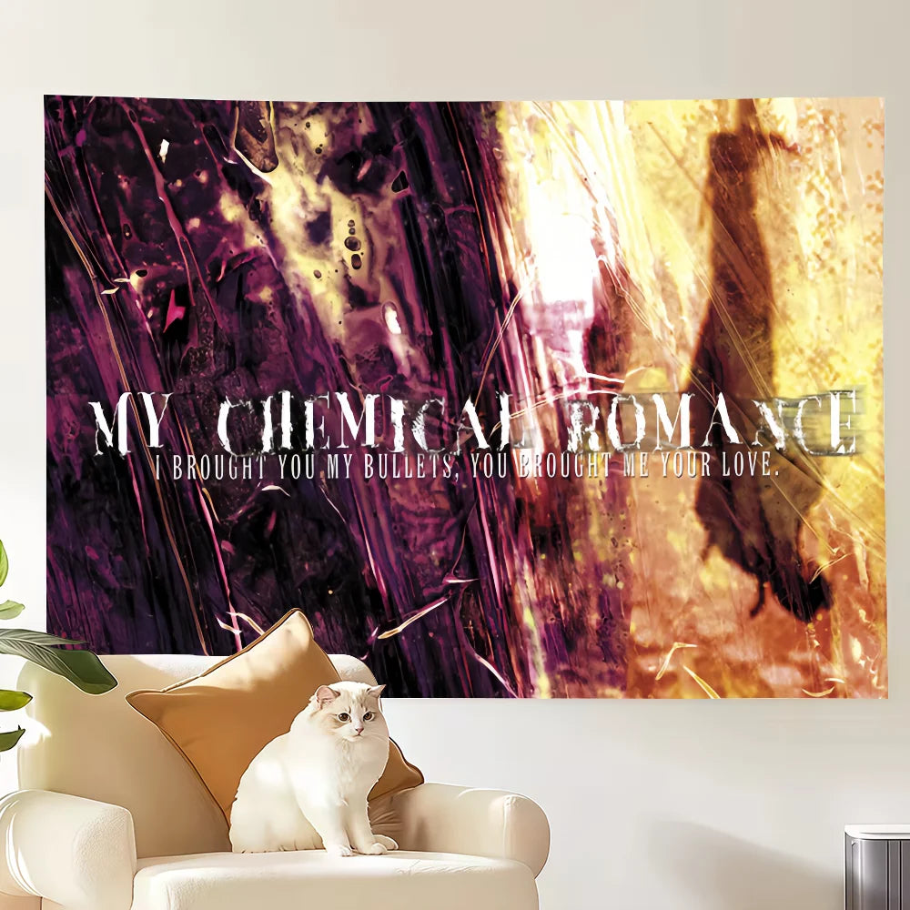 A framed poster featuring a My Chemical Romance theme with a cat sitting in front of it.