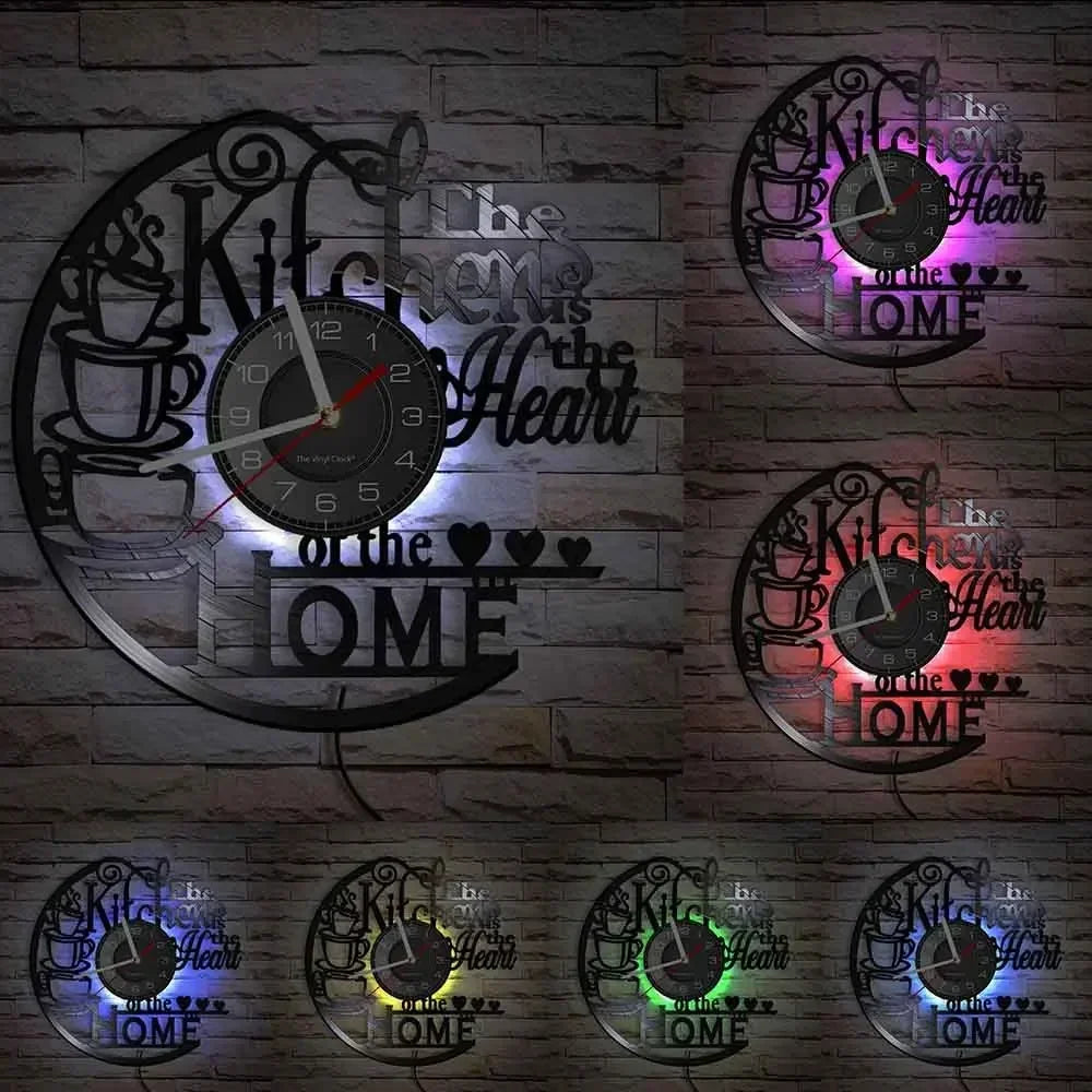 A collection of vintage vinyl record wall clocks featuring kitchen and heart designs mounted on a brick wall.