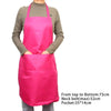 A bright pink waterproof kitchen apron worn by a person, showing the front pocket and neck belt details.