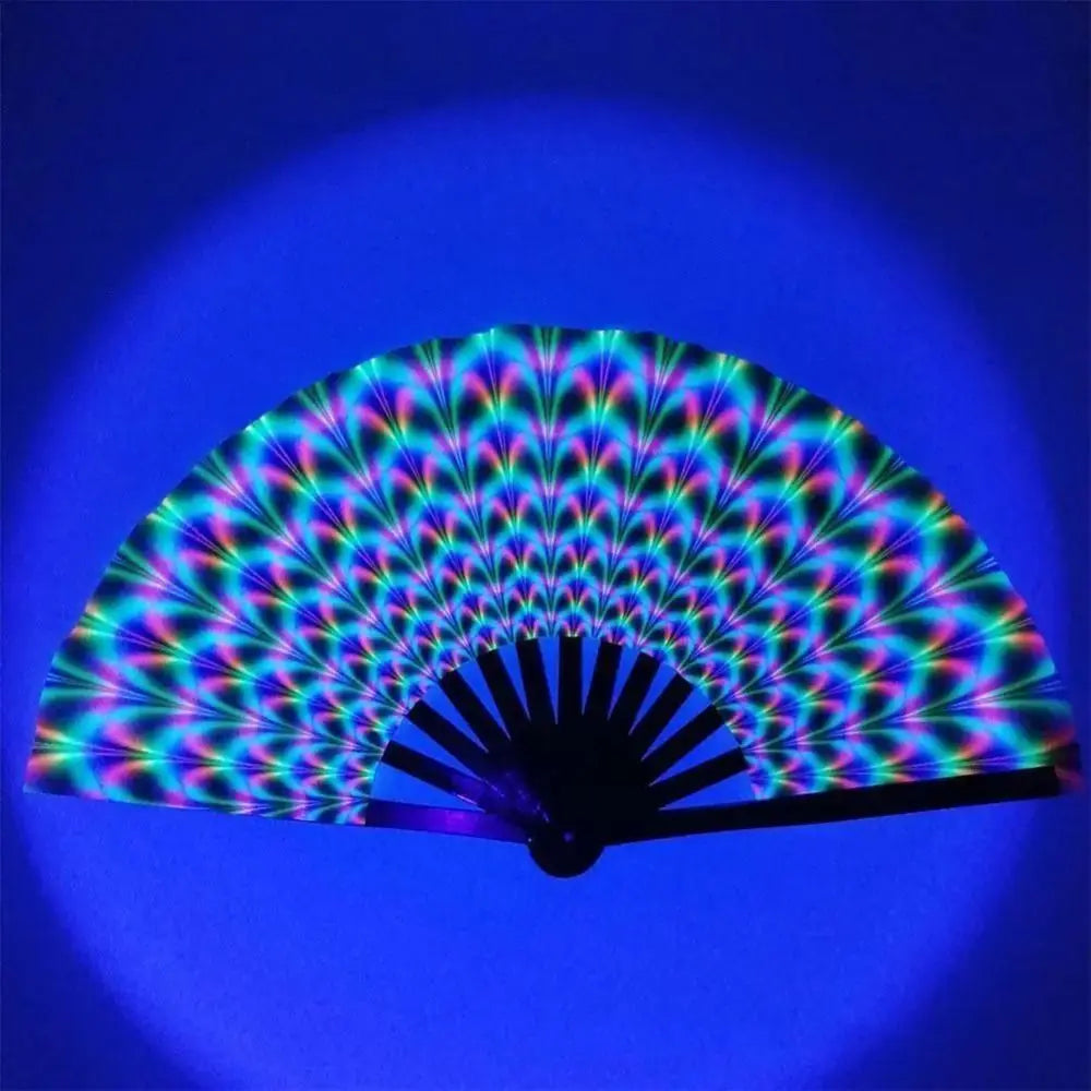 UV fluorescent handheld folding fan displaying a vibrant spectrum of colors against a blue background.