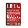 A vintage metal tin sign with white text on a distressed red background that reads Life is too short to wake up with regrets 
