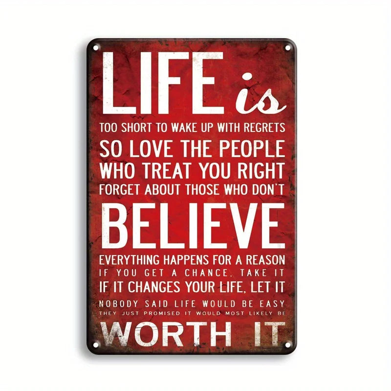 A vintage metal tin sign with white text on a distressed red background that reads Life is too short to wake up with regrets 