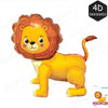 A yellow lion plush toy used as birthday decor, featuring a large mane and playful expression.