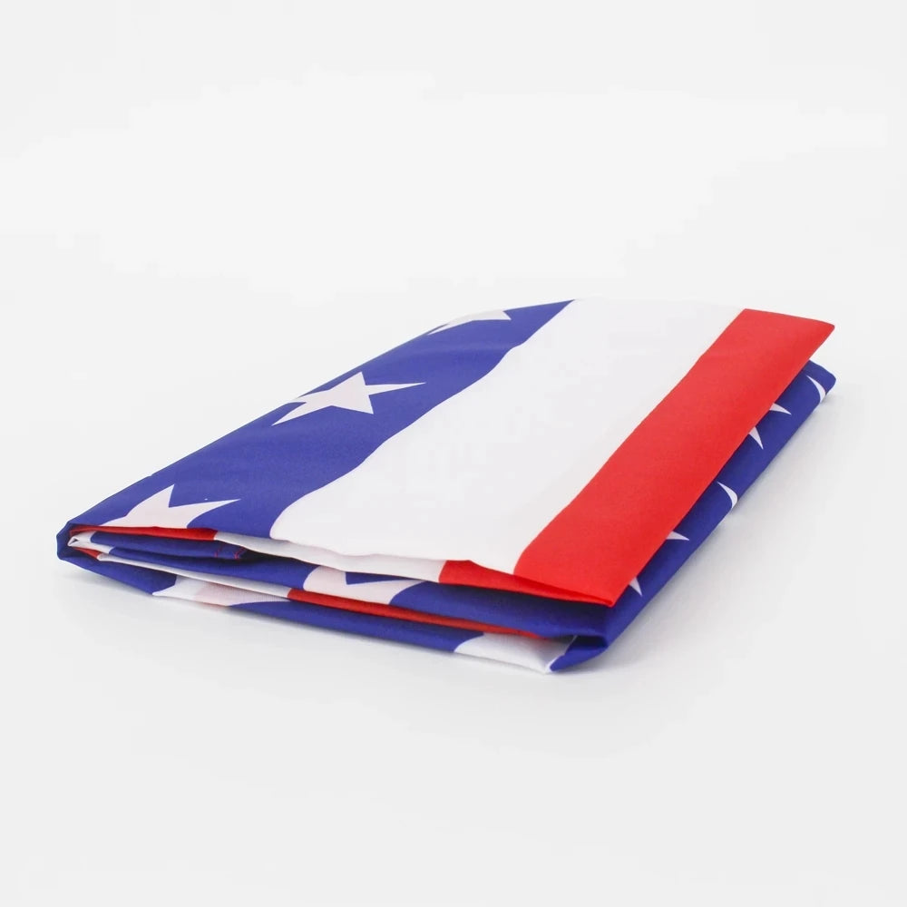 A folded large embroidered USA flag banner showing the stars and stripes design.