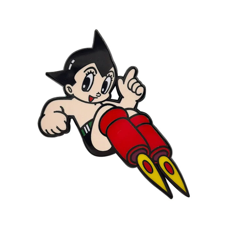 An enamel pin featuring a cartoon character with black hair and large eyes making a pointing gesture.