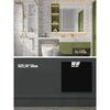 A modern bathroom or kitchen wall featuring marble-patterned decals and green cabinetry.