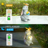 A gray rabbit statue with a butterfly light is shown in two contexts: auto charging during the day and auto working at night.